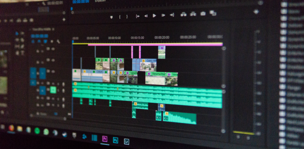 Close-up of a video editing timeline on a software interface, showing multiple audio and video tracks with clips, effects, and transitions